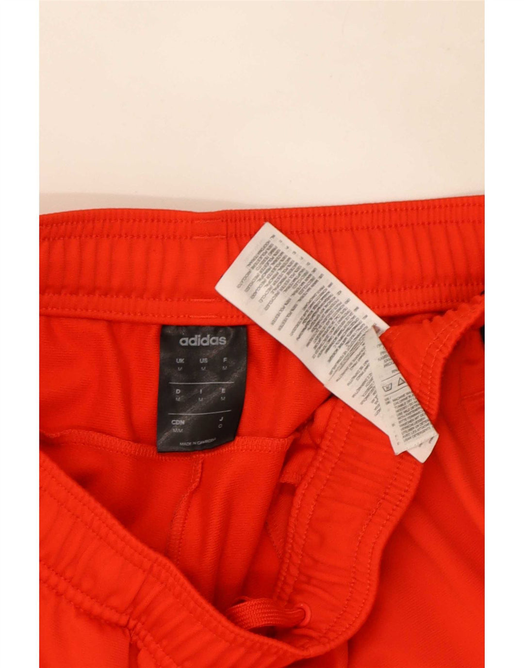 Pantaloni da tuta da uomo Adidas in poliestere rosso medio
