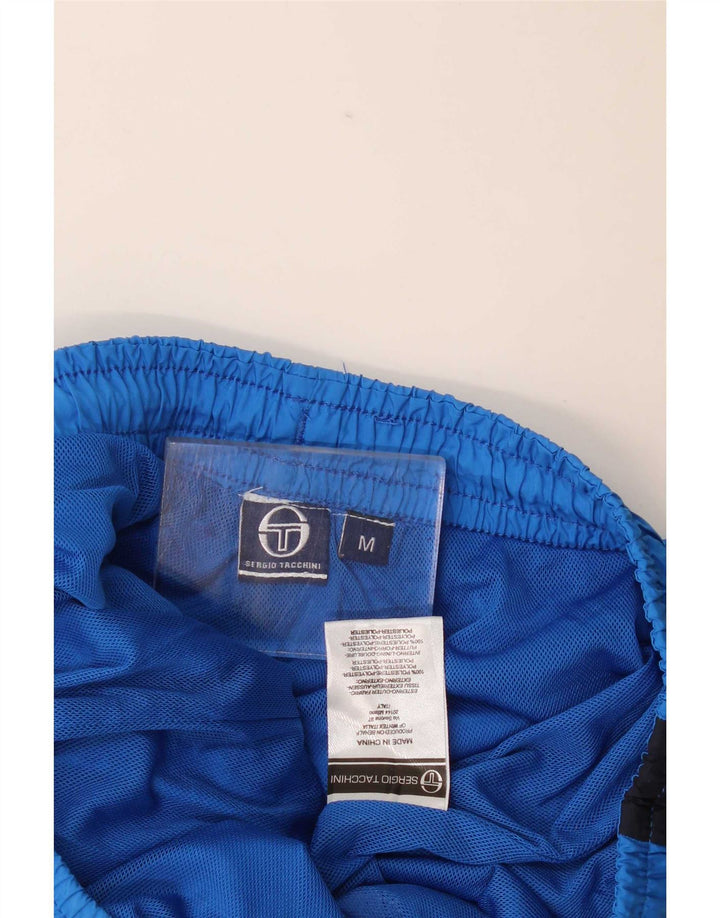 Pantaloni da tuta da uomo Sergio Tacchini in poliestere color block blu medio