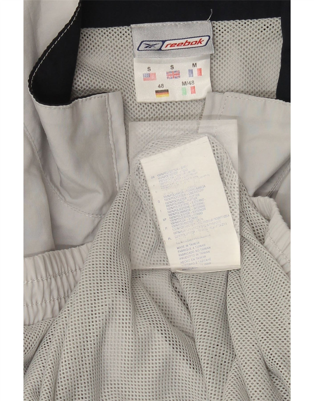 Giacca da ginnastica da uomo Reebok vestibilità ampia, piccola, in poliestere color block grigio