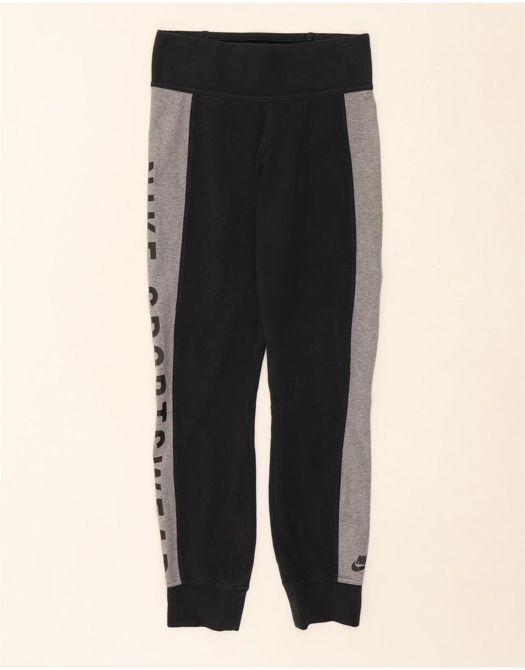 NIKE Womens Graphic Tracksuit Trousers Joggers Large  Black Colourblock Vintage Nike and Second-Hand Nike from Messina Hembry 
