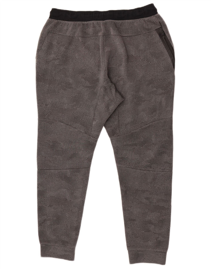 Pantaloni da tuta da uomo Nike Joggers grandi in cotone grigio