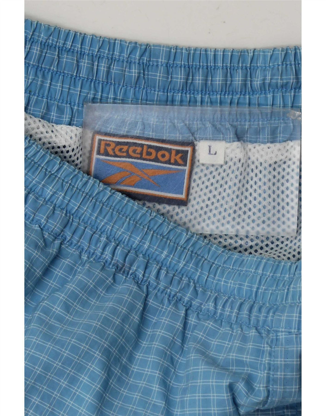 Pantaloncini sportivi Reebok da uomo, grandi quadri blu