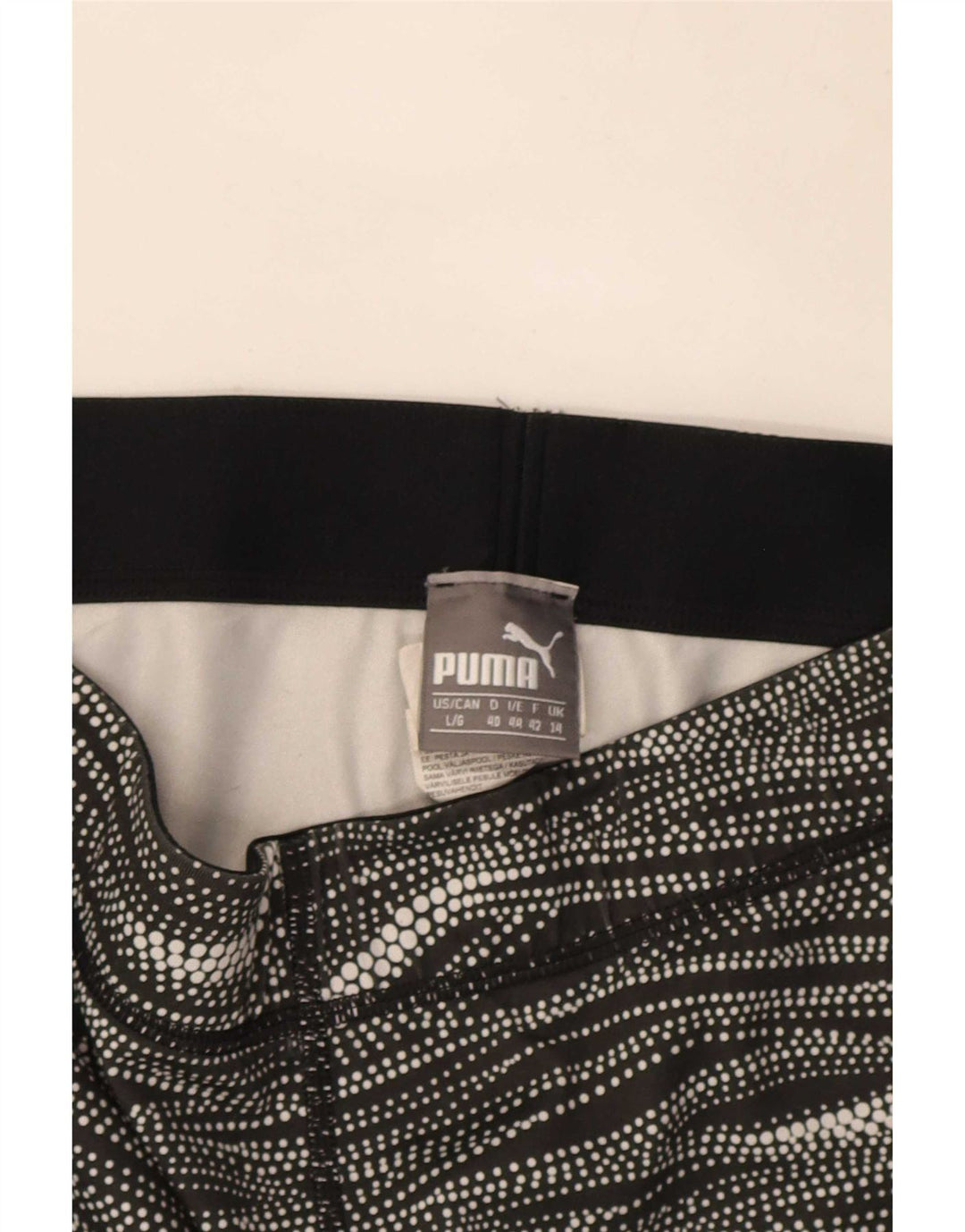 Leggings Capri da donna Puma UK 14 poliestere a righe nere medie