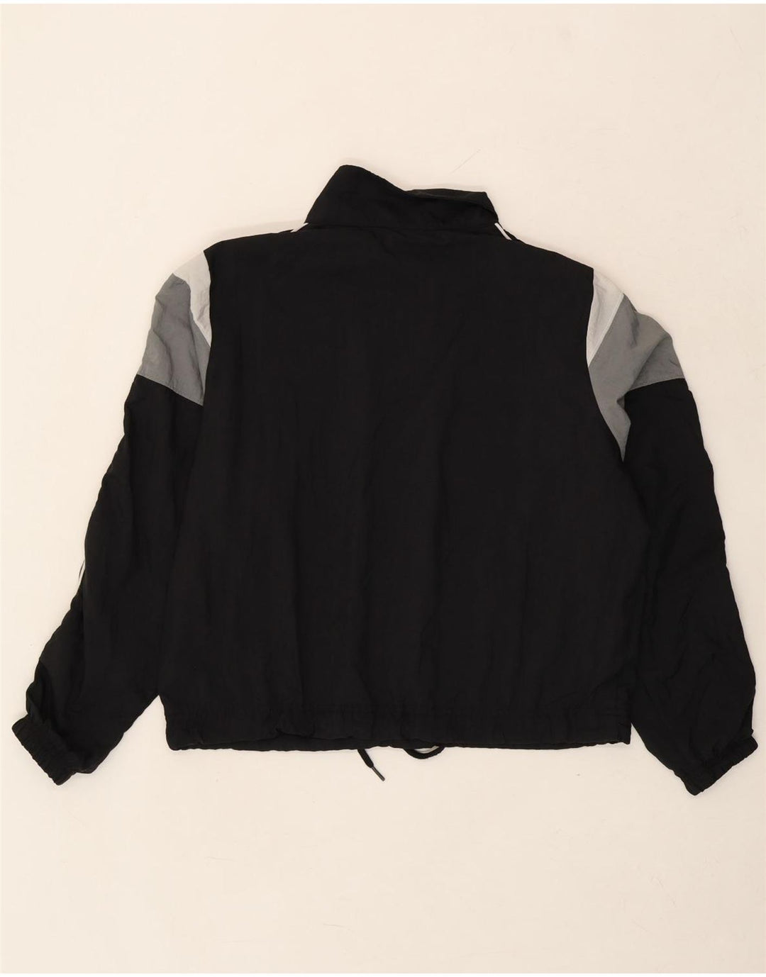 NIKE Womens Oversized Pullover Tracksuit Top UK 6 XS Black Colourblock Vintage Nike and Second-Hand Nike from Messina Hembry 