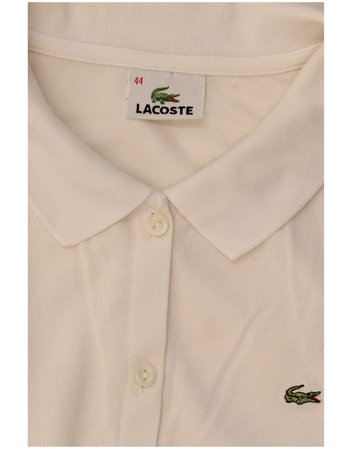 Camicetta da donna a maniche corte Lacoste taglia 44 grande bianca