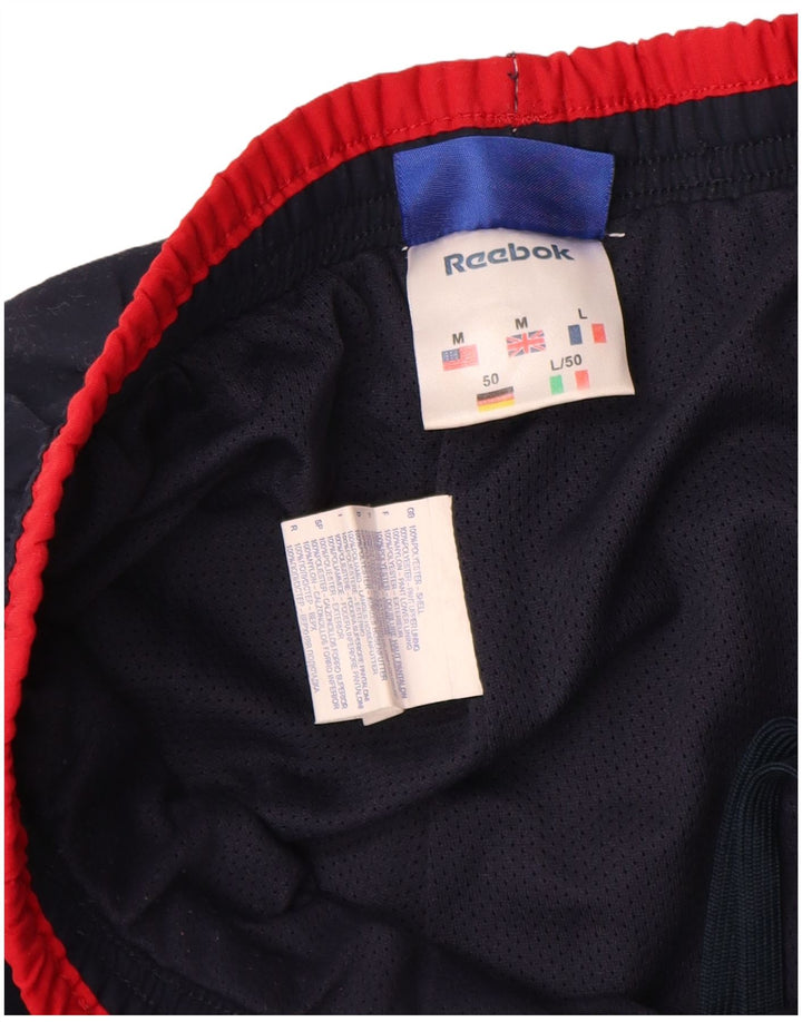 Pantaloni da tuta da uomo Reebok Joggers Medium Blu Navy Colourblock