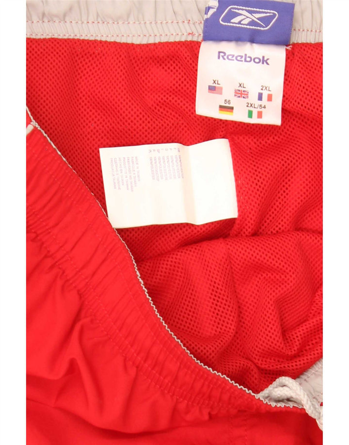 Pantaloni della Tuta Capri da Uomo Reebok XL Rosso Poliestere