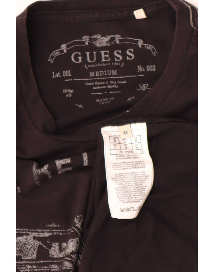Guess T-shirt grafica regolare da uomo, top in cotone nero medio