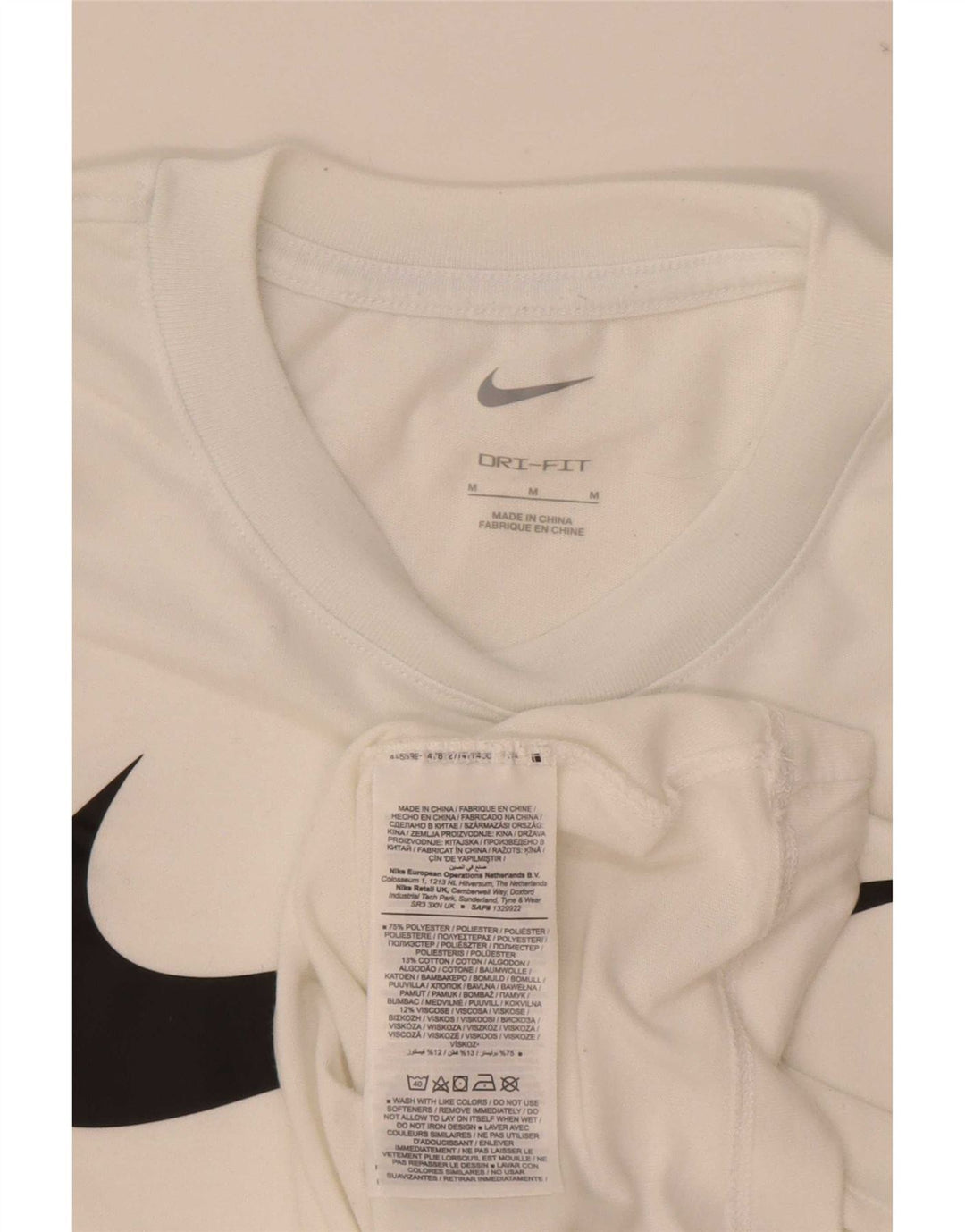 T-shirt grafica Nike Dri Fit da uomo, parte superiore in poliestere bianco medio