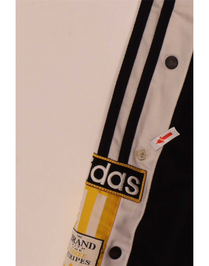 Pantaloni da tuta grafica da uomo Adidas, poliestere color block medio nero