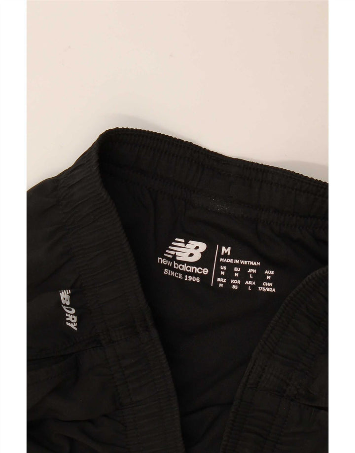 Pantaloncini sportivi da uomo New Balance medi neri