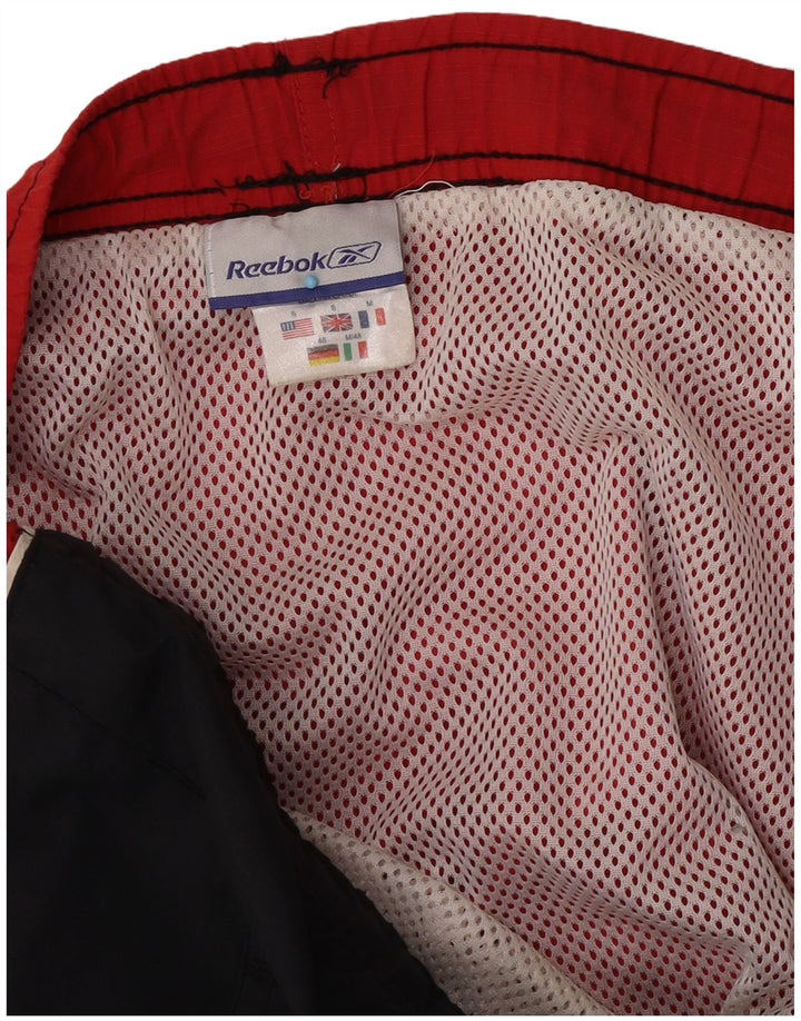 Pantaloncini da bagno grafici da uomo Reebok piccoli in nylon color block nero