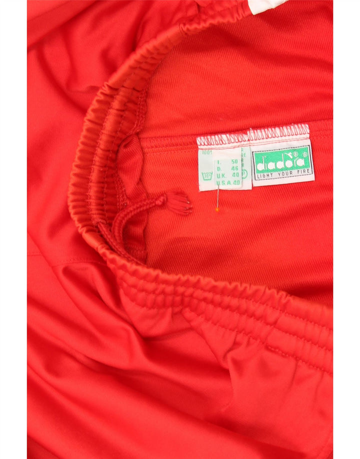 DIADORA Pantaloni da tuta con grafica da uomo UK 40 Medium Red Colourblock