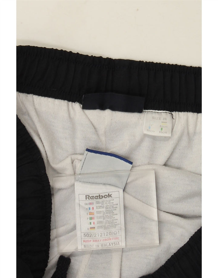 Pantaloni da tuta da uomo Reebok medi in poliestere blu navy