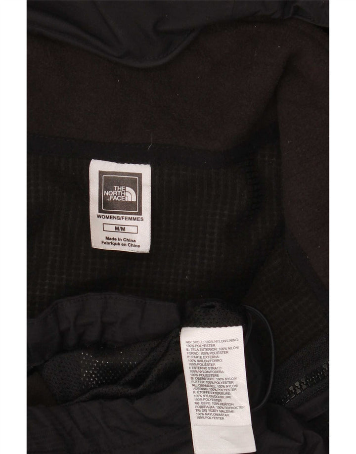 Giacca a vento con cappuccio da donna The North Face UK 12 Medium Nera