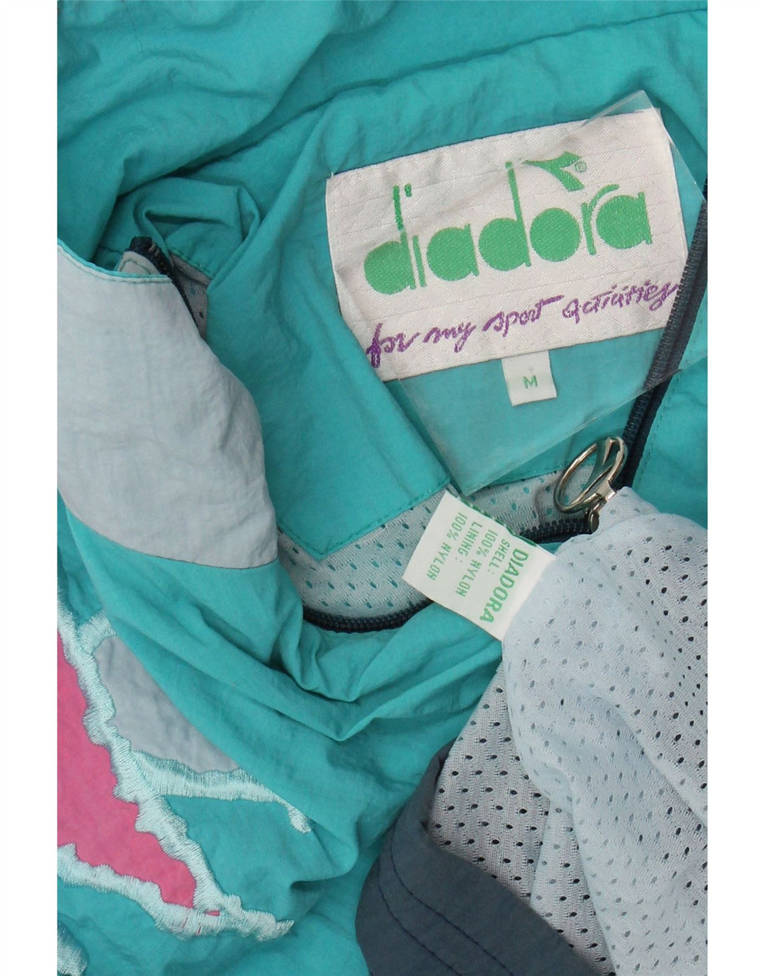 DIADORA Giacca da tuta da uomo vestibilità ampia in nylon color block blu medio