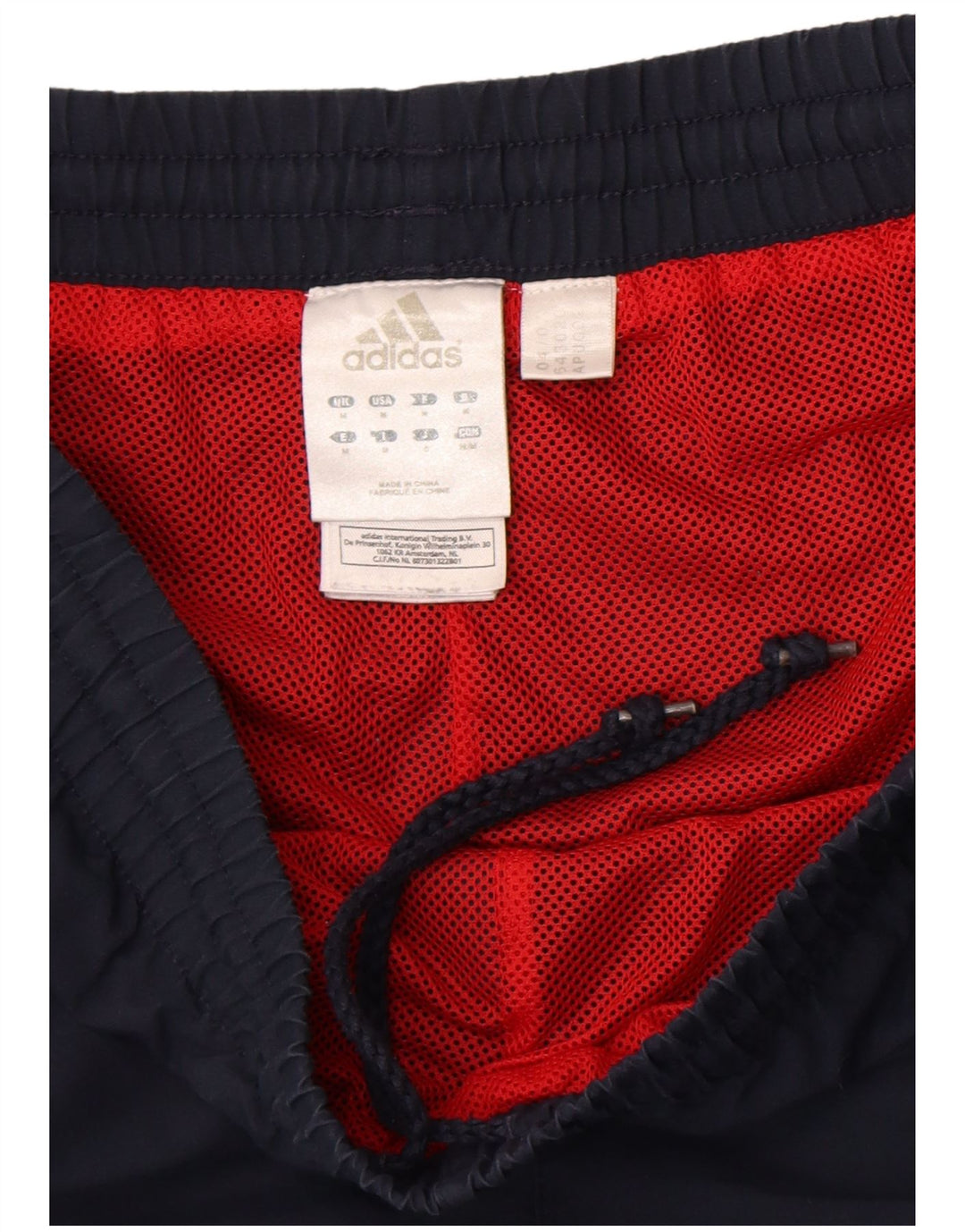 Pantaloni da tuta da uomo Adidas medi in poliestere blu navy