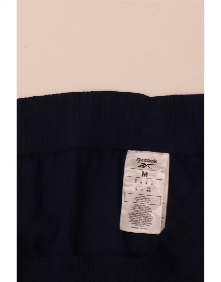 Pantaloni da tuta da uomo Reebok Joggers Medium Blu Navy Poliammide