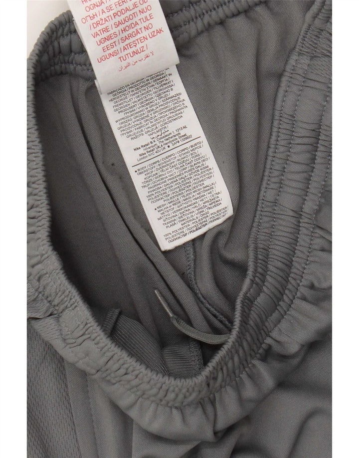 Pantaloni della tuta da ragazzo Nike Dri Fit 13-14 anni XL Poliestere grigio