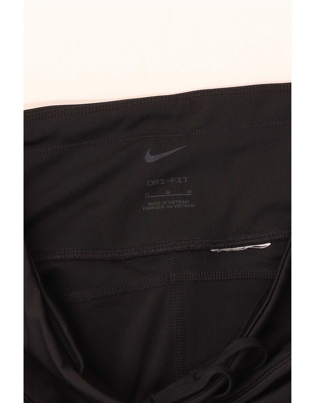 Pantaloni della tuta Nike Dri Fit da donna UK 14 medio nero