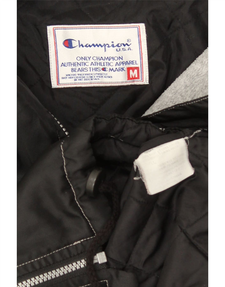 Giacca a vento con cappuccio da uomo CHAMPION UK 38 Medium Nero Poliammide