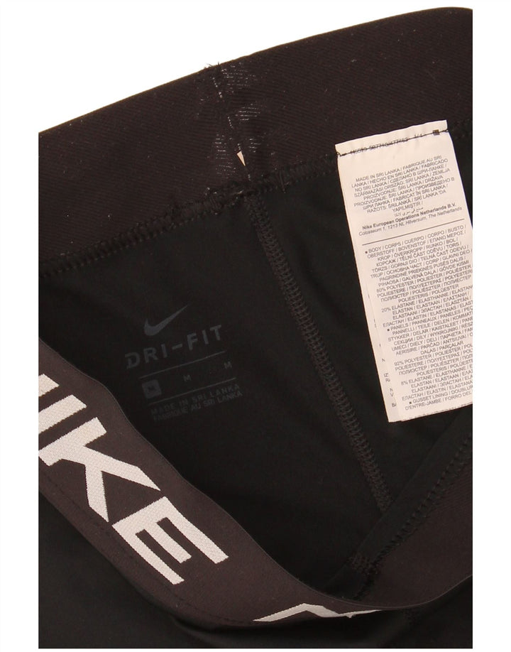 Leggings Capri con grafica NIKE da donna UK 12 poliestere nero medio