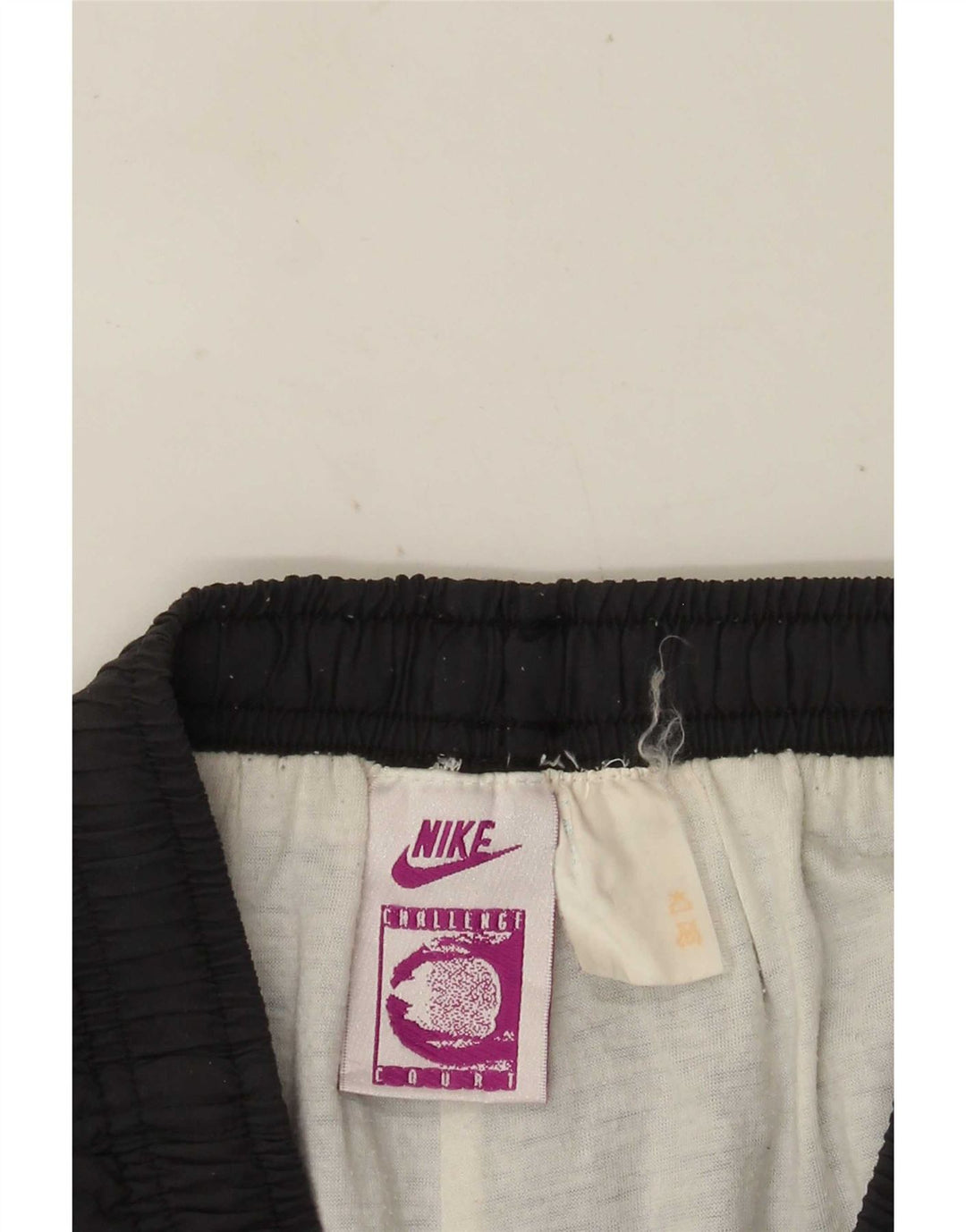 Pantaloni della tuta da uomo Nike Joggers piccoli grigi