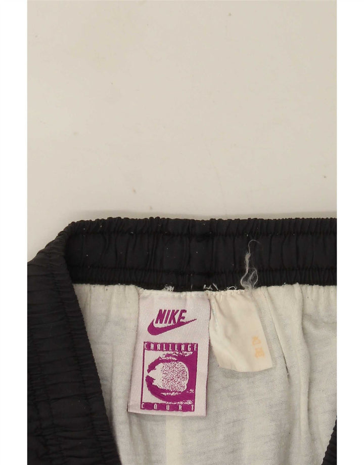 Pantaloni della tuta da uomo Nike Joggers piccoli grigi