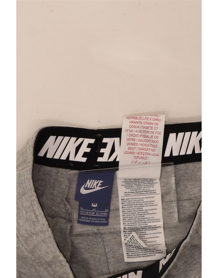 NIKE Boys Tracksuit Trousers Joggers 10-11 Years Medium Grey Colourblock Vintage Nike and Second-Hand Nike from Messina Hembry 