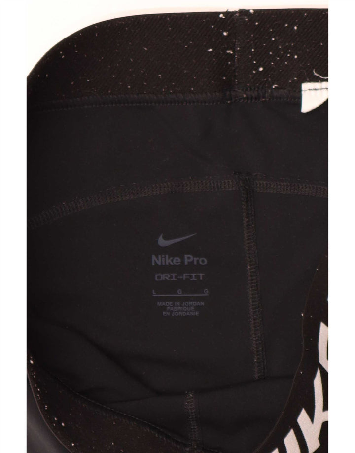 Leggings grafici Nike Dri Fit da donna UK 14 grandi neri