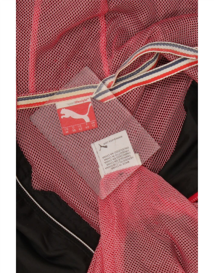 Giacca antipioggia con cappuccio da donna PUMA UK 12 media nera