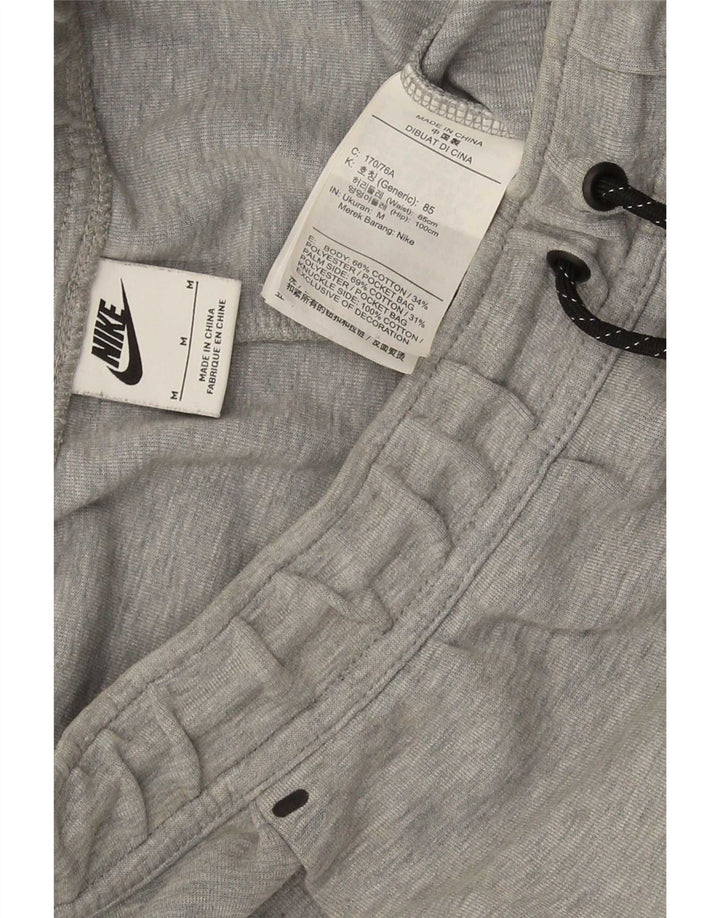Pantaloni da tuta da uomo Nike Joggers in poliestere grigio medio