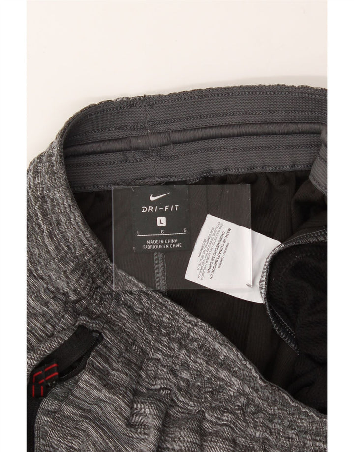 NIKE Mens Tracksuit Trousers Joggers Large  Grey Pinstripe Polyester Vintage Nike and Second-Hand Nike from Messina Hembry 