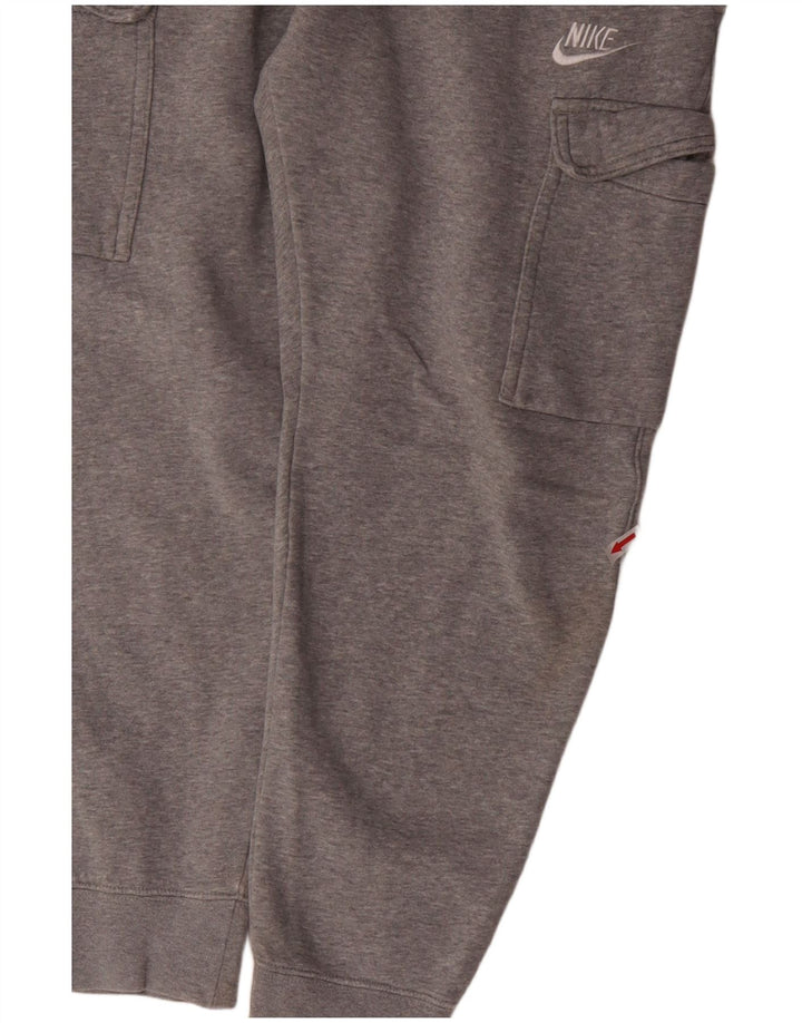 Pantaloni da tuta Nike da uomo Cargo Joggers piccoli in cotone grigio
