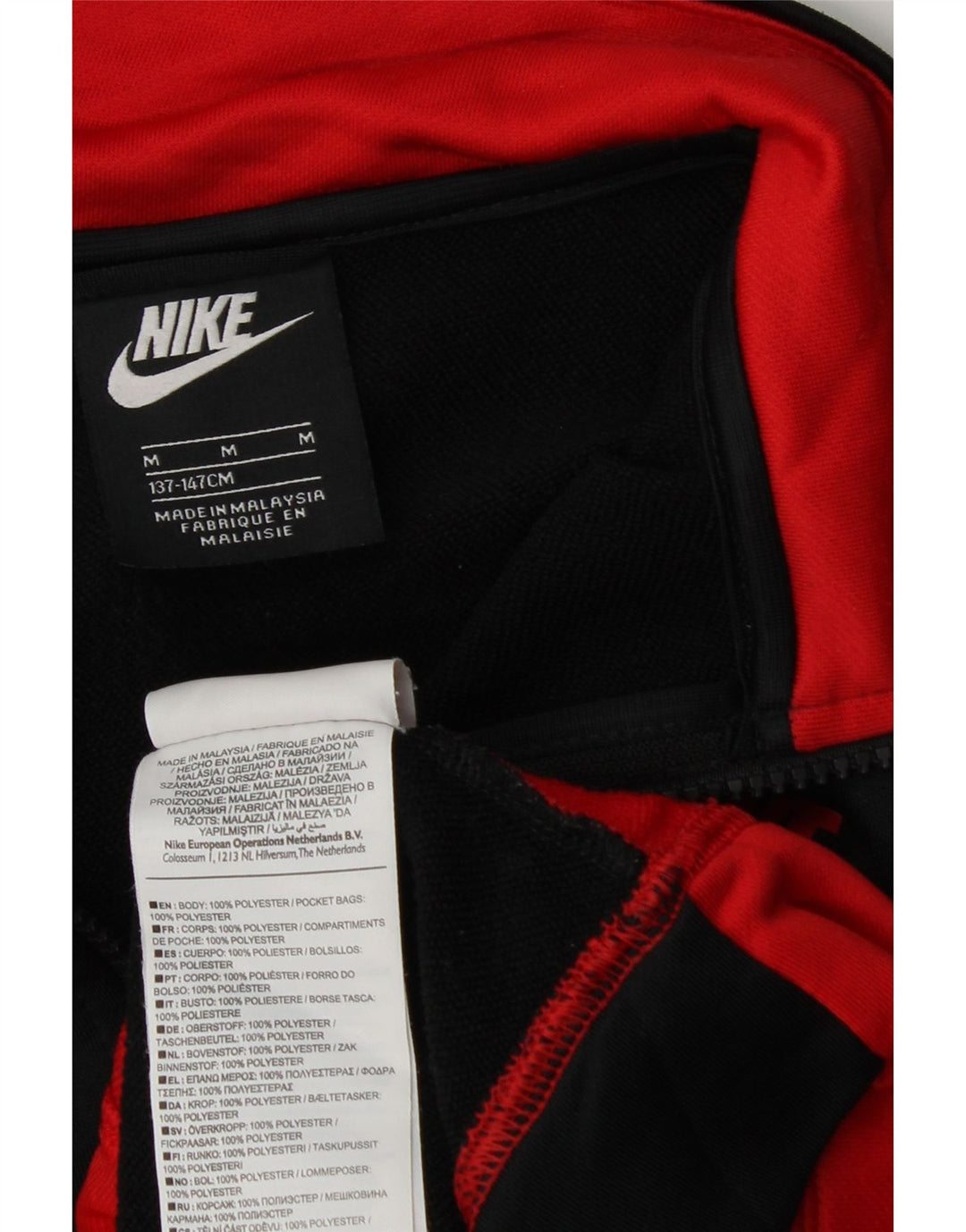Giacca superiore della tuta da ragazzo Nike 10-11 anni blocco colore nero medio