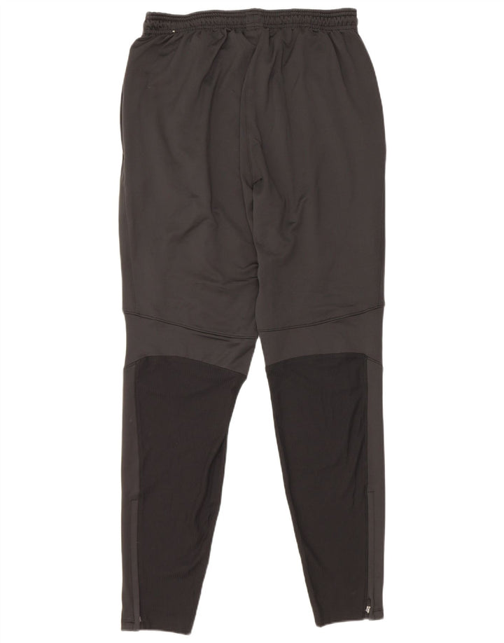 Pantaloni da tuta Nike Therma-Fit da uomo in poliestere nero medio