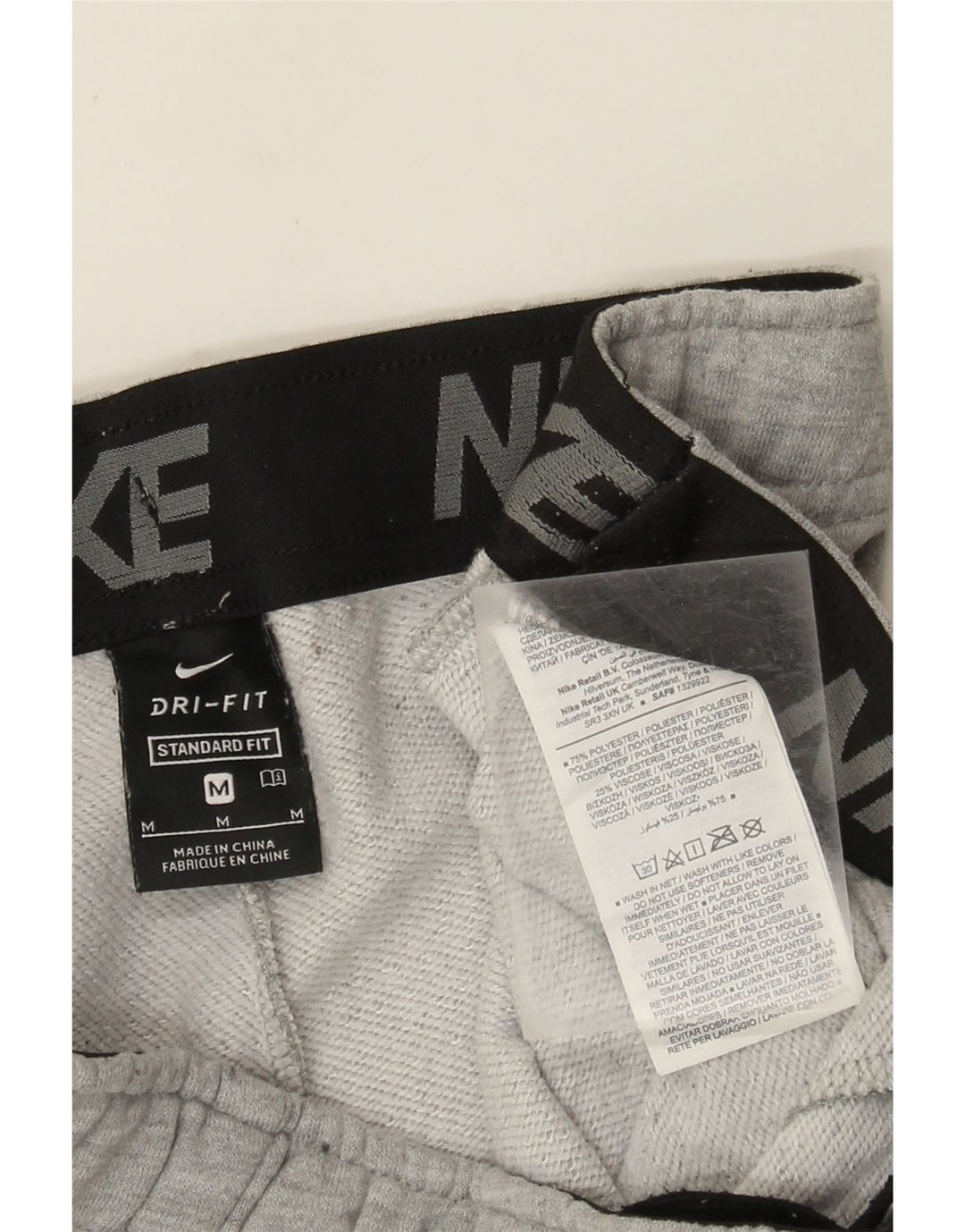 Pantaloni da tuta da uomo Nike Dri Fit Joggers grigio medio chiazzato