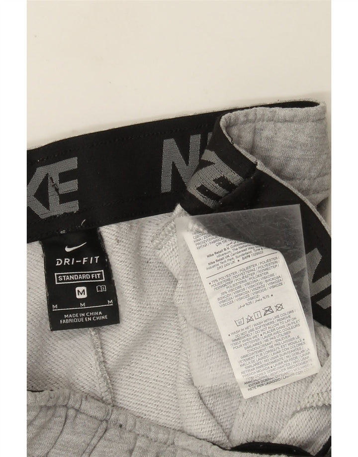 Pantaloni da tuta da uomo Nike Dri Fit Joggers grigio medio chiazzato