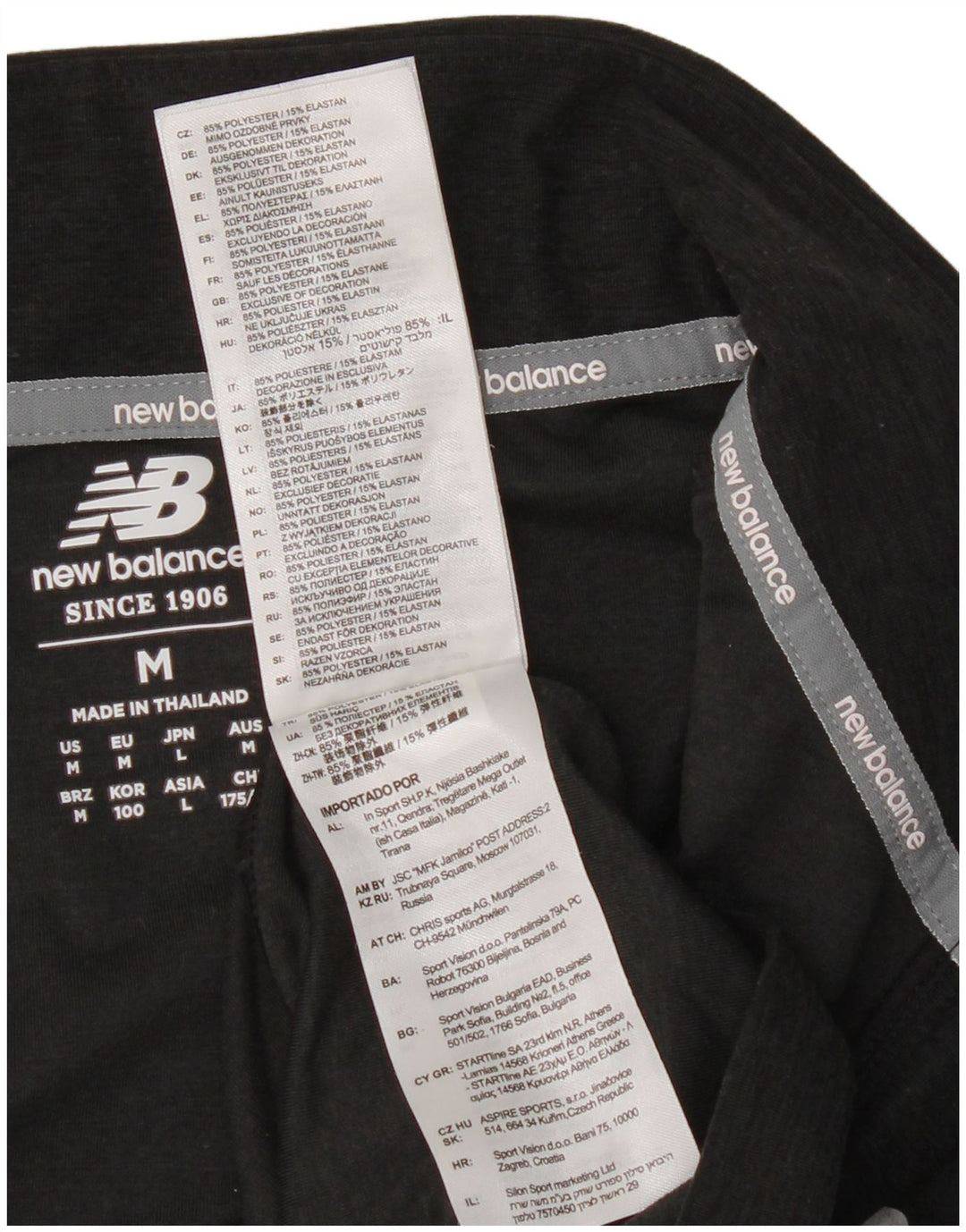 Maglia da ginnastica da uomo New Balance con zip e collo, media, nera screziata