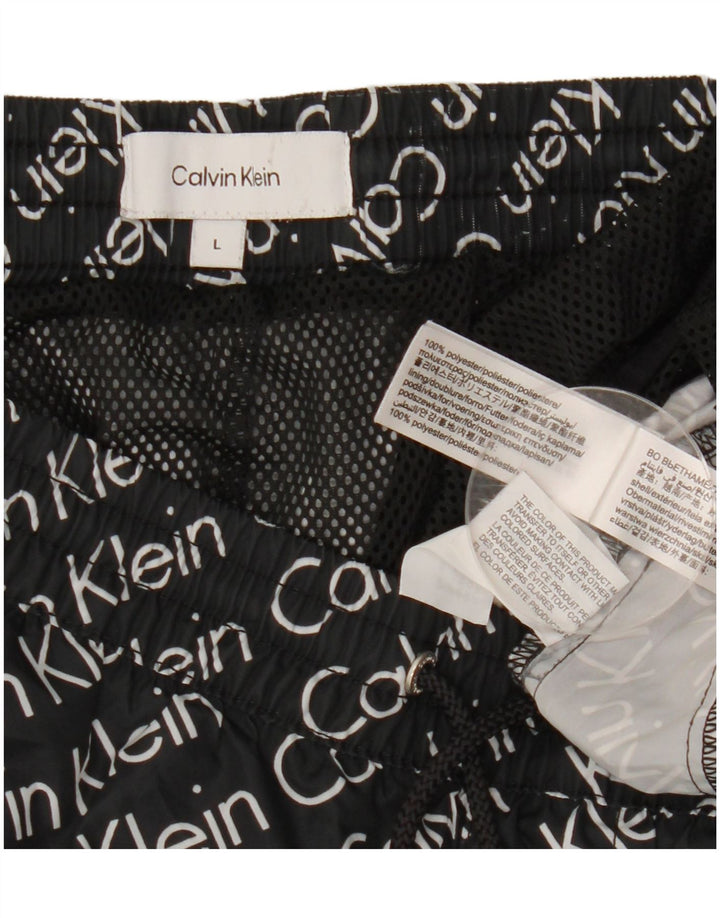Pantaloncini da bagno grafici da uomo Calvin Klein grandi in poliestere nero