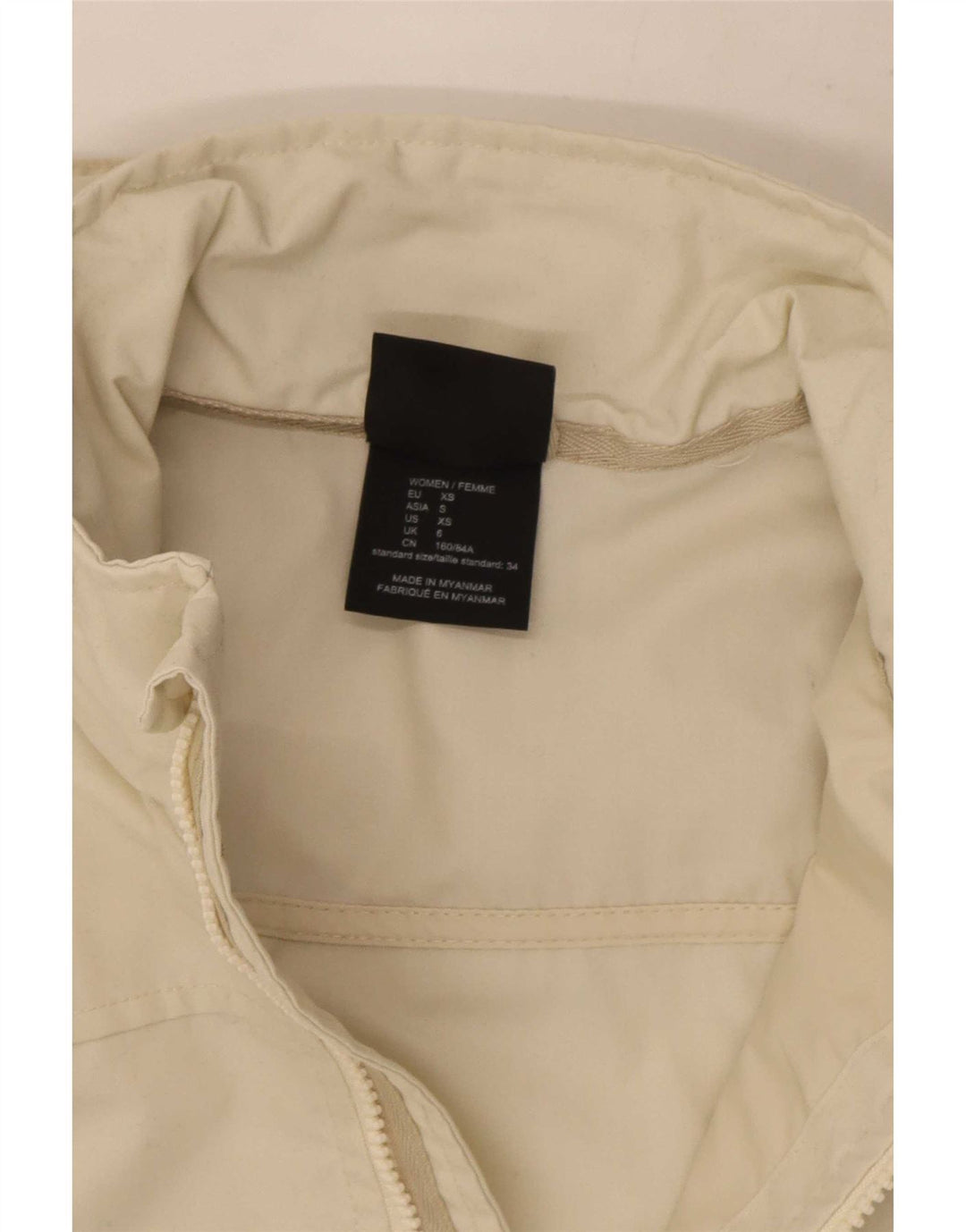 Giacca antipioggia con cappuccio da donna Jack Wolfskin UK 6 XS poliestere bianco sporco