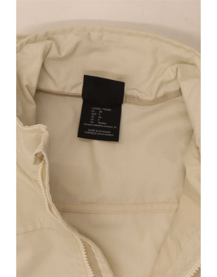 Giacca antipioggia con cappuccio da donna Jack Wolfskin UK 6 XS poliestere bianco sporco