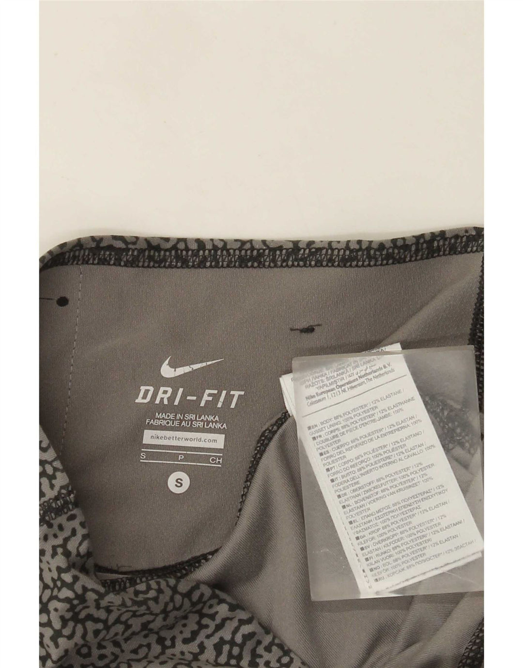 Leggings Capri da donna Dri Fit modello astratto Nike UK 10 piccolo grigio