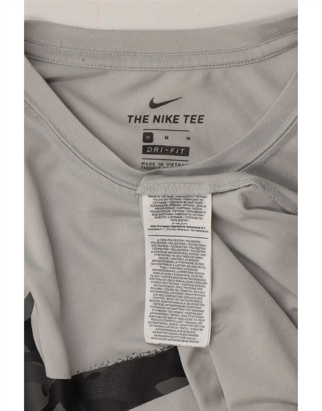 T-shirt grafica Nike Dri Fit da uomo in poliestere grigio medio