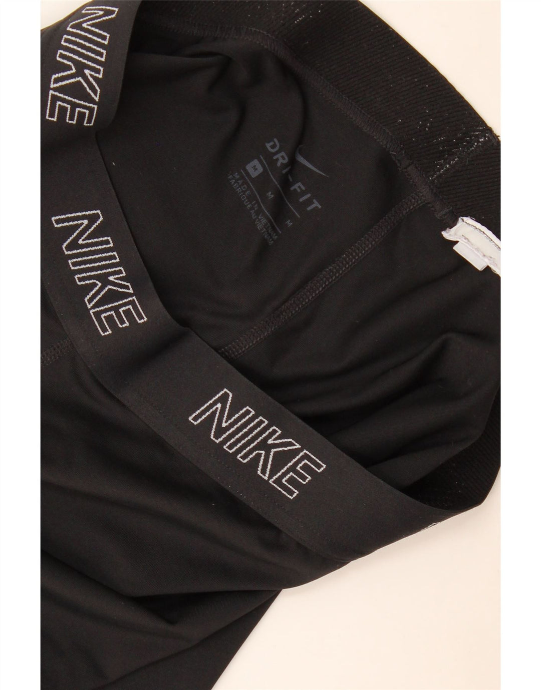 Leggings Nike Dri Fit Graphic Capri da donna UK 12 medio nero