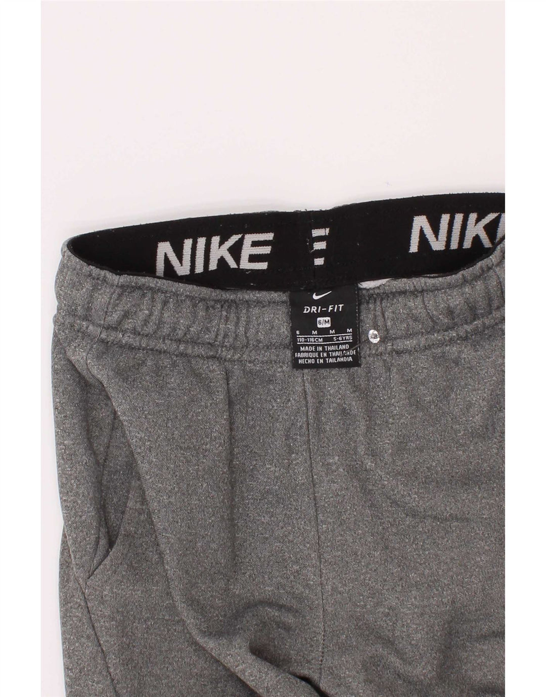 Pantaloni da tuta Nike da ragazzo Dri Fit Joggers 5-6 anni Grigio medio chiazzato