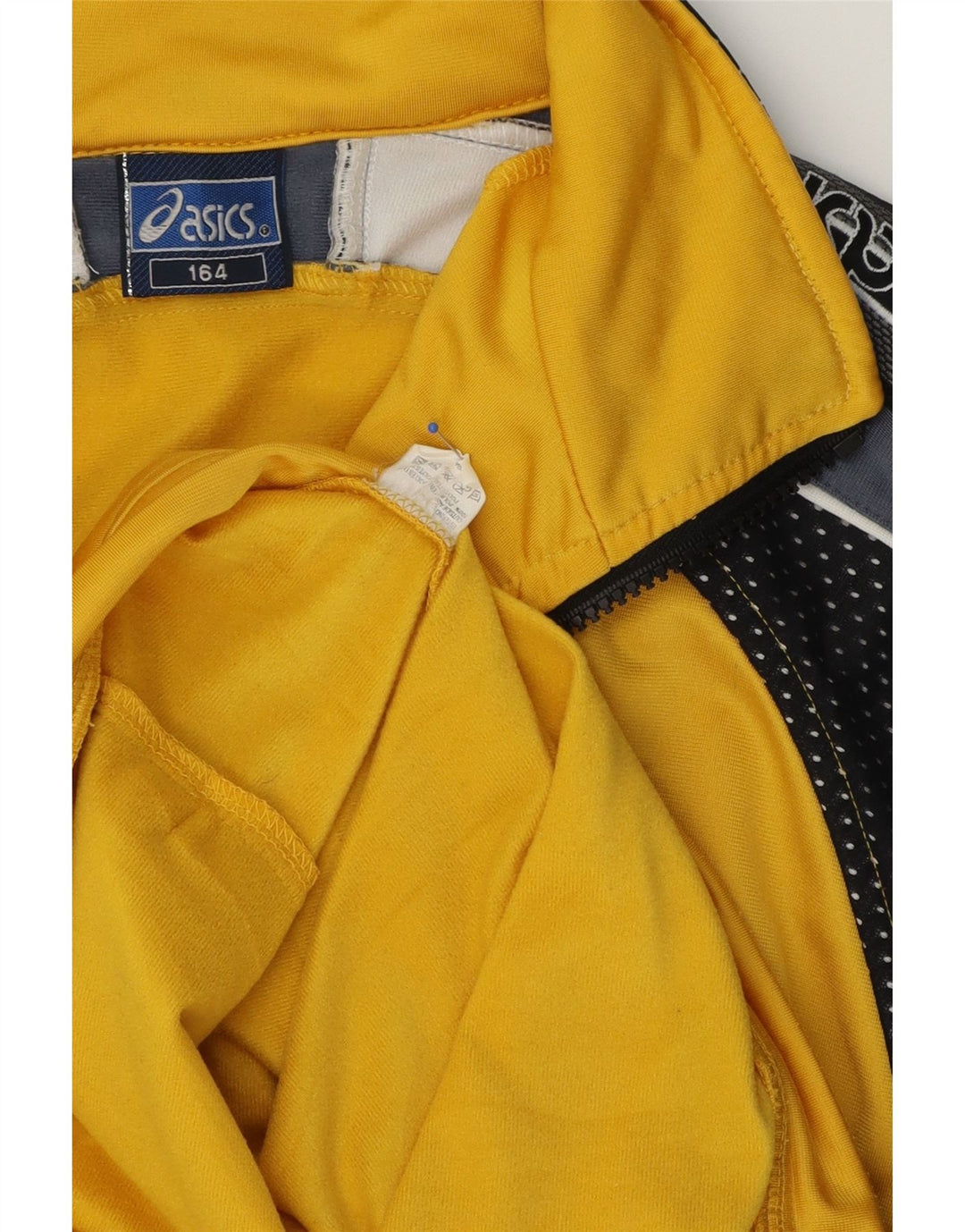 Giacca da tuta grafica da ragazzo Asics 13-14 anni Colorblock giallo
