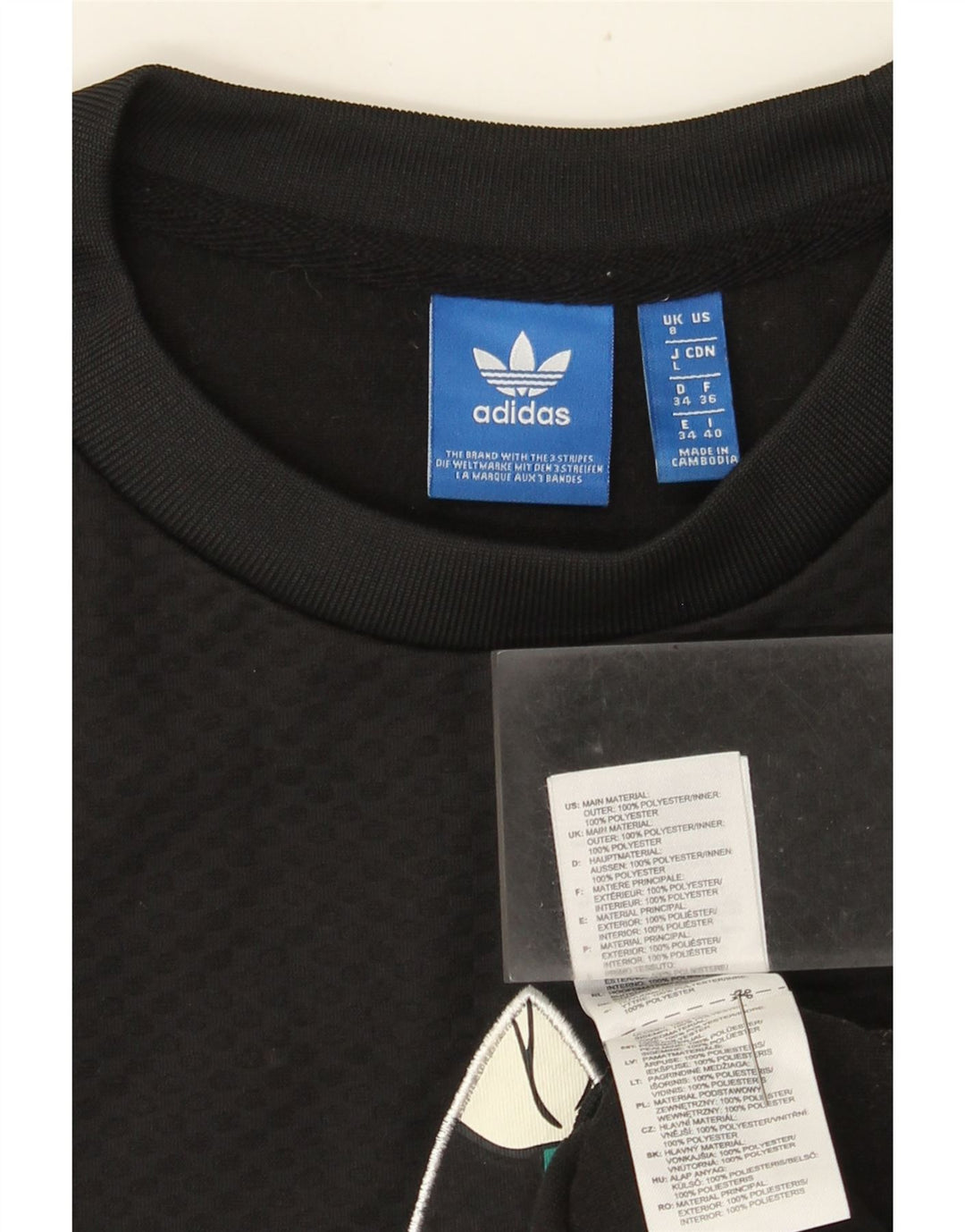 Felpa grafica da donna Adidas Jumper UK 8 Small Black geometrica