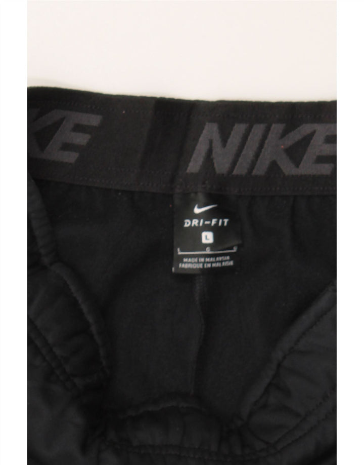 NIKE Boys Graphic Tracksuit Trousers 12-13 Years Large  Black Polyester Vintage Nike and Second-Hand Nike from Messina Hembry 