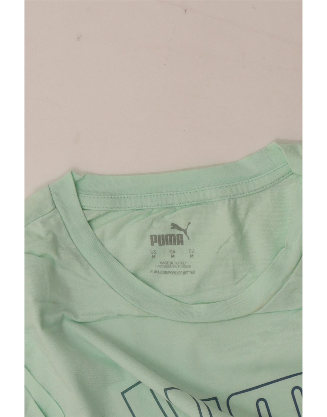 T-shirt grafica da donna Puma UK 14 verde medio